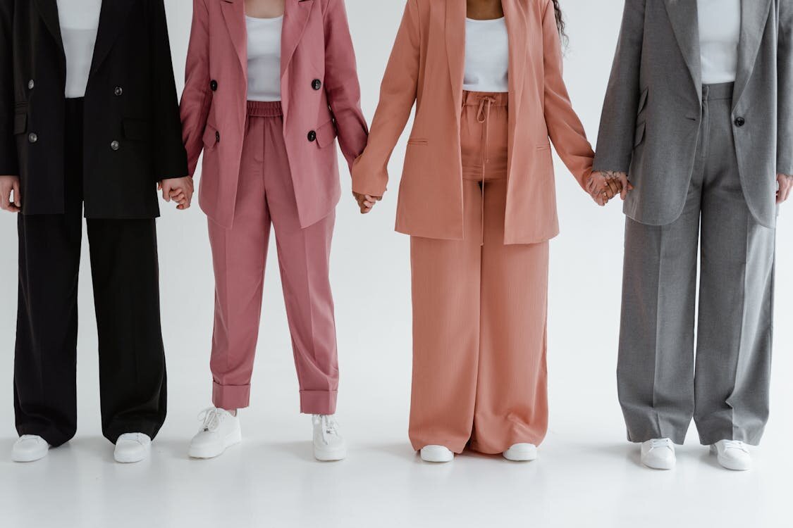 Jordan Stolch MiKADO Personal Styling example of neutral-toned suits showcasing lifestyle branding and cohesive professional fashion identity